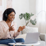 woman talking on headphones